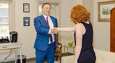 Anthony Montagna meeting with a client